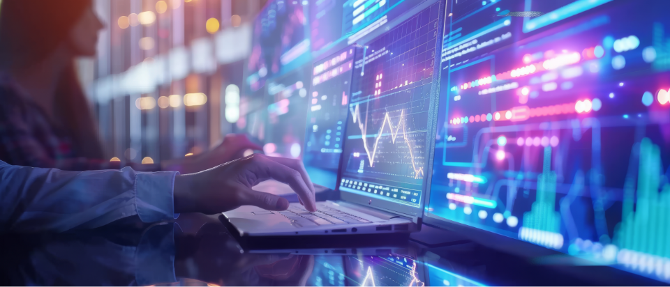 Person trading with a laptop.